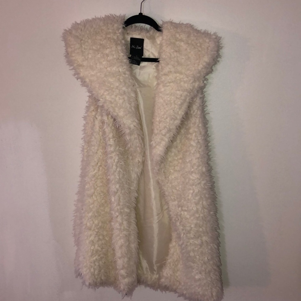 White faux fur vest